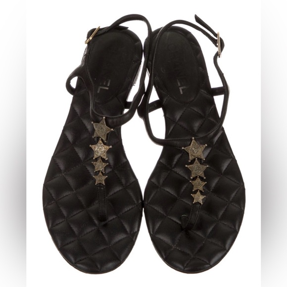 CHANEL Shoes - CHANEL flat Black Quilted Sandals with CC Star Accents